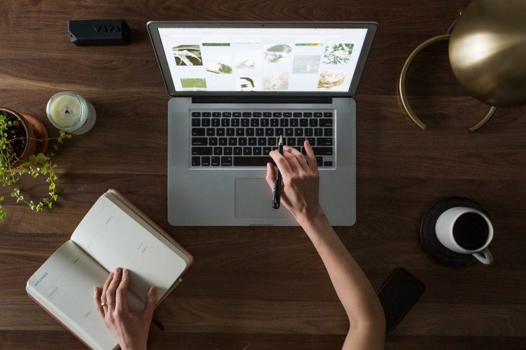 Woman working on notebook